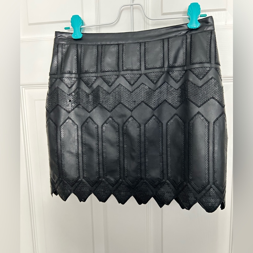 Black leather mini skirt